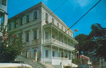 Featured is a vintage 1950's postcard image of the Governor's Mansion at Charlotte Amalie, St. Thomas, US Virgin Islands (one of the US Territories).  The original postcard is for sale in The unltd.com Store.
